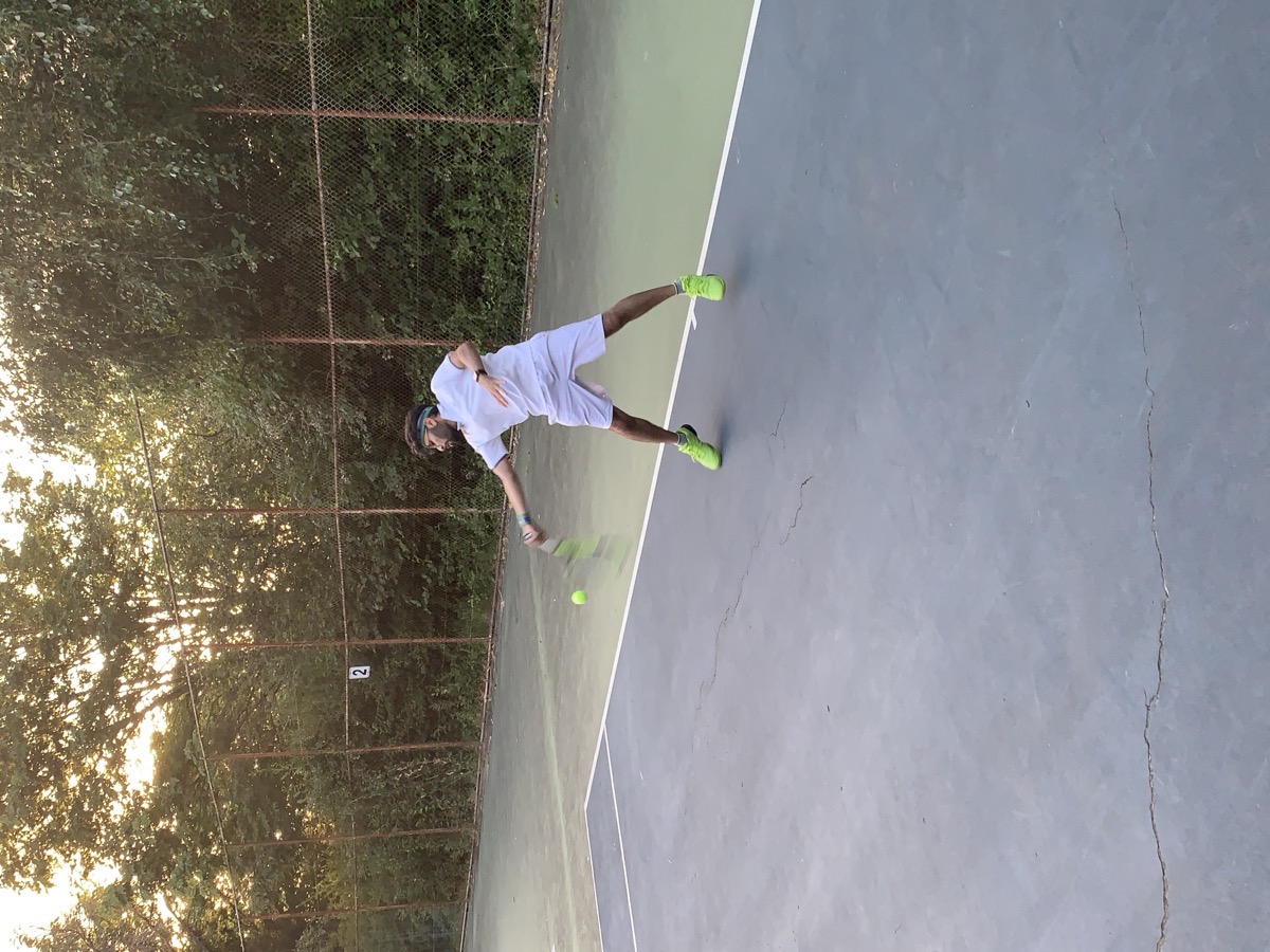 Jay playing tennis